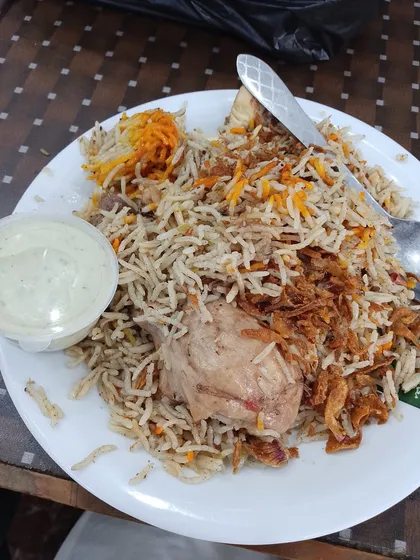 A full plate of Dehli chicken biryani