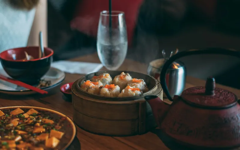 Dim sum in a bamboo steamer, the opening picture of himalayan.sitey.pk